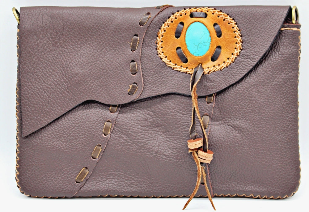 Handmade Cowhide leather adjustable clutch/purse with stone accent