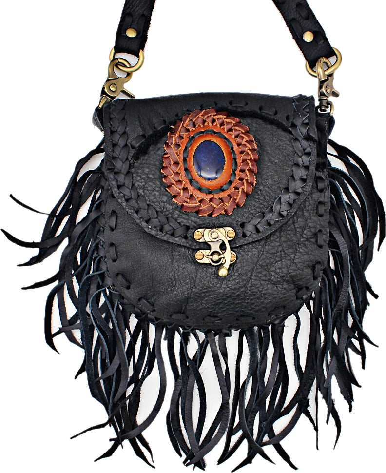 New Vintage rehabs old handbags with fringe, feathers and TLC