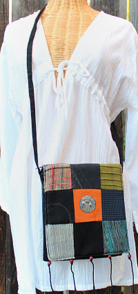 Handmade cotton textile patchwork cross body with elephant medallions accent
