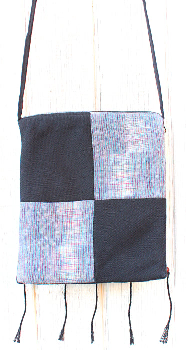 Handmade cotton textile patchwork cross body with elephant medallions accent