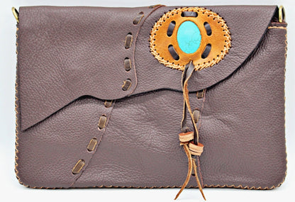 Handmade Cowhide leather adjustable clutch/purse with stone accent