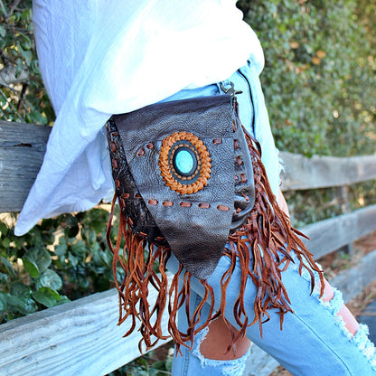 Handmade genuine leather bohemian saddle bag with fringe and stone accent