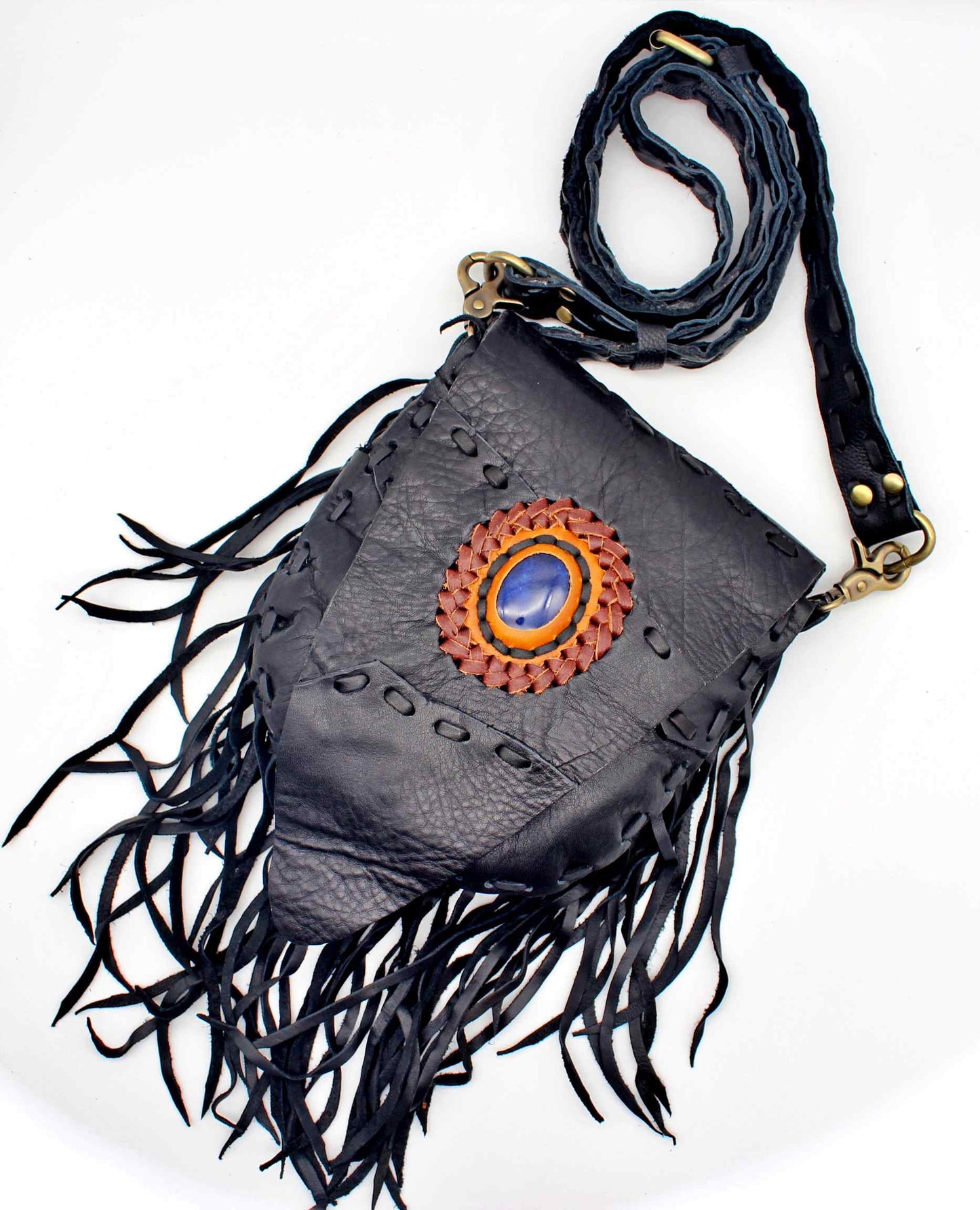 Handmade genuine leather bohemian saddle bag with fringe and premium stone accent
